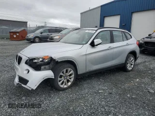 2014 BMW X1 xDrive28i z VIN WBAVL1C55EVY20009, wystawiony jako Copart lot #58561935 z przebiegiem Nie podano mil oraz Szkody całkowita. Historia ofert i sprzedaży dostępna na DreamBid. Obrazek 1.