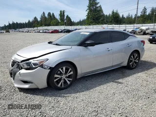 2016 Nissan Maxima S with VIN 1N4AA6AP1GC432806, listed as a Copart auction lot 59634215 with 176,394 mi miles and Salvage title. Bid and sale history available at DreamBid. Image 1.