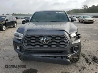 2021 Toyota Tacoma SR z VIN 3TMCZ5ANXMM433788, wystawiony jako Copart lot #51614785 z przebiegiem 58 157 mil mil oraz Czysty tytuł • Clean title. Historia ofert i sprzedaży dostępna na DreamBid. Obrazek 5.