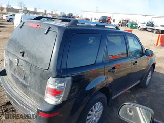 2009 Mercury Mariner Premier with VIN 4M2CU87G39KJ22933, listed as a IAAI auction lot 41780392 with 126,972 mi miles. Bid and sale history available at carsss.com. Image 4.