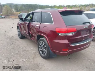 2017 Jeep Grand Cherokee Overland with VIN 1C4RJECG6HC719001, listed as a IAAI auction lot 41795517 with 103,076 mi miles. Bid and sale history available at carsss.com. Image 3.