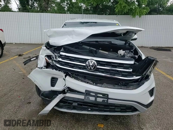 2023 Volkswagen Atlas SE z VIN 1V2HE2CA5PC204949, wystawiony jako Copart lot #59323505 z przebiegiem 17 689 mil mil oraz Szkoda całkowita • Salvage title. Historia ofert i sprzedaży dostępna na DreamBid. Obrazek 14.