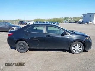 2015 Toyota Corolla L with VIN 2T1BURHE6FC475488, listed as a IAAI auction lot 42134578 with 96,177 mi miles and . Bid and sale history available at DreamBid. Image 14.