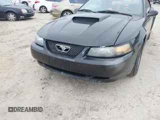 2004 Ford Mustang Deluxe with VIN 1FAFP44454F110688, listed as a IAAI auction lot 41371035 with 188,754 mi miles. Bid and sale history available at carsss.com. Image 6.