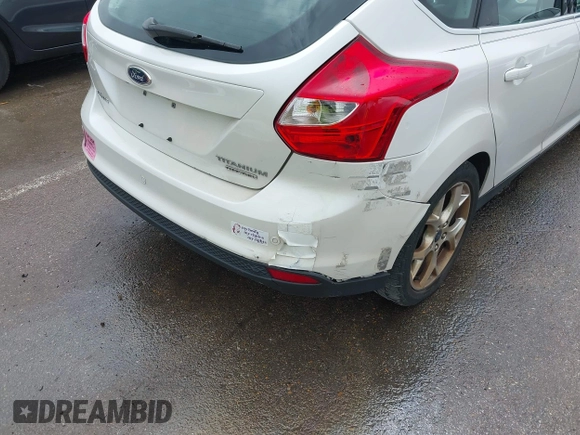 2014 Ford Focus Titanium with VIN 1FADP3N24EL184220, listed as a IAAI auction lot 42429610 with 172,575 mi miles and . Bid and sale history available at DreamBid. Image 19.