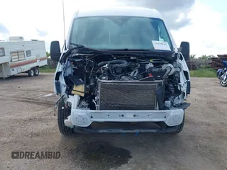 2024 Ford Transit Cargo z VIN 1FTBR1C84RKA32473, wystawiony jako IAAI lot #42438142 z przebiegiem 40 817 mil mil oraz . Historia ofert i sprzedaży dostępna na DreamBid. Obrazek 13.