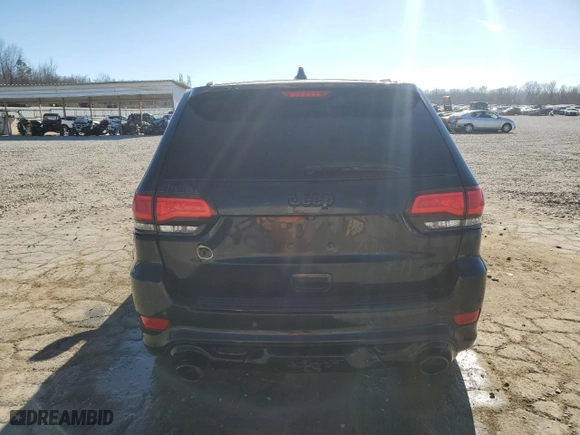 2015 Jeep Grand Cherokee SRT with VIN 1C4RJFDJ1FC663370, listed as a Copart auction lot 86608514 with 123,209 mi miles and Salvage Title. Bid and sale history available at carsss.com. Image 6.