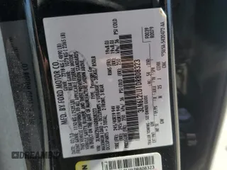 2013 Lincoln MKZ Hybrid with VIN 3LN6L2LU1DR808323, listed as a Copart auction lot 58077725 with 128,837 mi miles and Salvage title. Bid and sale history available at DreamBid. Image 12.