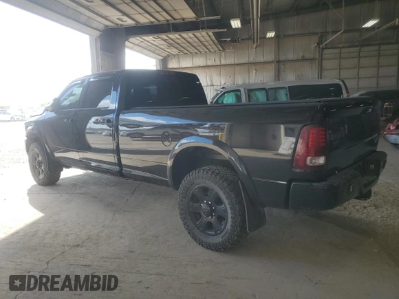 2014 Ram 3500 Laramie with VIN 3C63R3JL9EG258069, listed as a Copart auction lot 71571664 with 104,983 mi miles and Salvage Title. Bid and sale history available at carsss.com. Image 2.