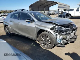 2022 Lexus UX 250h F Sport with VIN JTHE9JBH2N2062143, listed as a Copart auction lot 77345634 with 13,118 mi miles and Salvage Title. Bid and sale history available at DreamBid. Image 4.