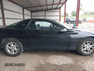 2002 Chevrolet Camaro z VIN 2G1FP22K822119358, wystawiony jako IAAI lot #42530943 z przebiegiem 98 277 mil mil oraz . Historia ofert i sprzedaży dostępna na DreamBid. Obrazek 13.