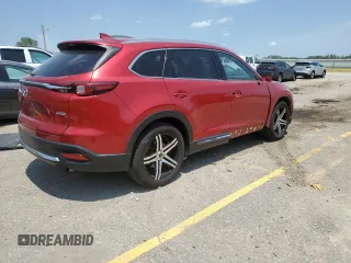 2016 Mazda CX-9 Grand Touring with VIN JM3TCADY6G0105783, listed as a Copart auction lot 63975195 with 135,972 mi miles and Salvage title. Bid and sale history available at DreamBid. Image 3.