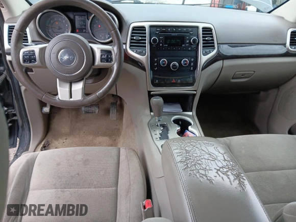 2011 Jeep Grand Cherokee Laredo z VIN 1J4RR4GG5BC508211, wystawiony jako Copart lot #53729935 z przebiegiem 124 408 mil mil oraz Szkoda całkowita • Salvage title. Historia ofert i sprzedaży dostępna na DreamBid. Obrazek 8.