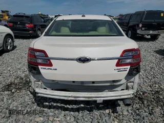 2016 Ford Taurus Limited with VIN 1FAHP2F85GG140107, listed as a Copart auction lot 66093895 with 72,614 mi miles and Salvage title. Bid and sale history available at DreamBid. Image 6.