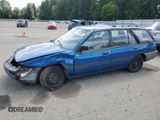 1992 Ford Escort with VIN 1FAPP15J6NW107212, listed as a Copart auction lot 60250385 with 57,238 mi miles and Salvage title. Bid and sale history available at DreamBid. Image 1.