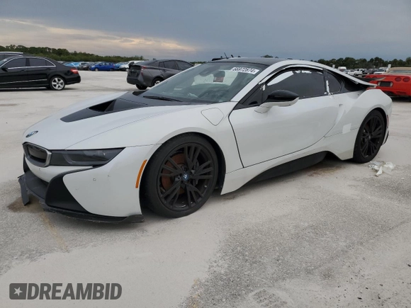 2015 BMW i8 z VIN WBY2Z2C56FV392042, wystawiony jako Copart lot #66972874 z przebiegiem Nie podano mil oraz Szkoda całkowita • Salvage title. Historia ofert i sprzedaży dostępna na DreamBid. Obrazek 1.