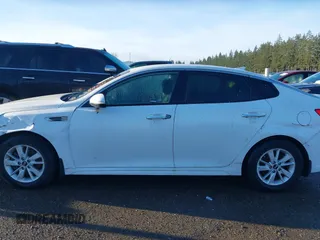 2016 Kia Optima LX with VIN 5XXGT4L31GG034993, listed as a IAAI auction lot 41881231 with 81,888 mi miles. Bid and sale history available at carsss.com. Image 15.