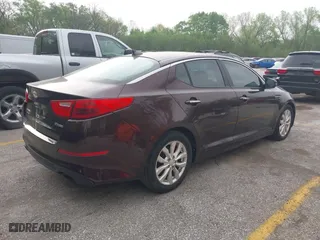 2014 Kia Optima EX with VIN 5XXGN4A71EG321621, listed as a IAAI auction lot 42077320 with 169,372 mi miles. Bid and sale history available at carsss.com. Image 4.