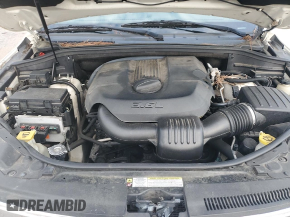 2011 Jeep Grand Cherokee Laredo with VIN 1J4RR4GG2BC581987, listed as a Copart auction lot 64072515 with 213,607 mi miles and Clean title. Bid and sale history available at DreamBid. Image 12.