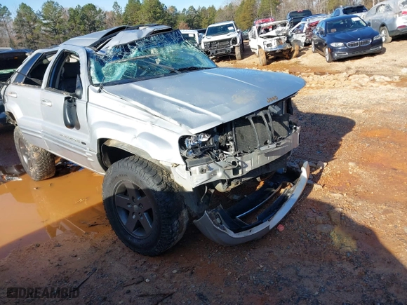 2004 Jeep Grand Cherokee Limited with VIN 1J4GW58S14C102826, listed as a IAAI auction lot 41081734 with 116,950 mi miles. Bid and sale history available at carsss.com. Image 1.