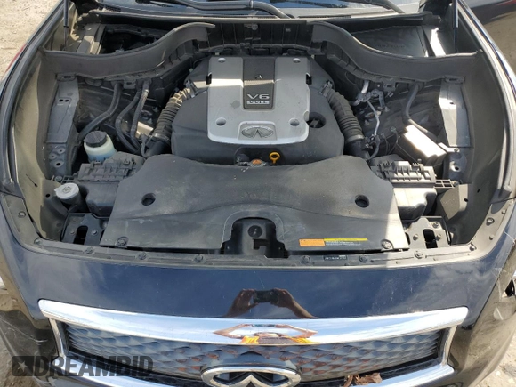 2017 Infiniti QX70 z VIN JN8CS1MU8HM142969, wystawiony jako Copart lot #50949945 z przebiegiem 99 664 mil mil oraz Szkoda całkowita • Salvage title. Historia ofert i sprzedaży dostępna na DreamBid. Obrazek 12.
