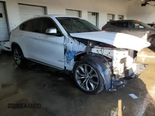 2016 BMW X6 xDrive35i with VIN 5UXKU2C5XG0N78230, listed as a Copart auction lot 77288623 with 116,205 mi miles. Bid and sale history available at carsss.com. Image 4.