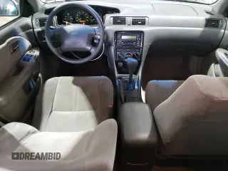 2001 Toyota Camry CE z VIN JT2BG22K410558183, wystawiony jako Copart lot #55600625 z przebiegiem 69 689 mil mil oraz Szkoda całkowita • Salvage title. Historia ofert i sprzedaży dostępna na DreamBid. Obrazek 8.