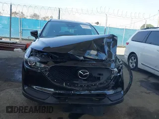 2020 Mazda CX-5 Touring with VIN JM3KFACM0L0804998, listed as a IAAI auction lot 41850998 with 44,519 mi miles. Bid and sale history available at carsss.com. Image 12.