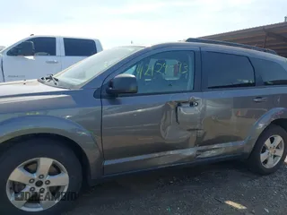 2013 Dodge Journey American Value with VIN 3C4PDCAB5DT509059, listed as a IAAI auction lot 42124093 with 162,904 mi miles and . Bid and sale history available at DreamBid. Image 14.