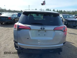 2018 Toyota RAV4 LE with VIN JTMBFREV8JJ224872, listed as a IAAI auction lot 41907962 with 104,605 mi miles and . Bid and sale history available at DreamBid. Image 16.
