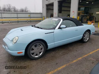 2003 Ford Thunderbird Deluxe with VIN 1FAHP60A03Y108186, listed as a Copart auction lot 86729574 with 79,624 mi miles and Salvage Title. Bid and sale history available at DreamBid. Image 1.