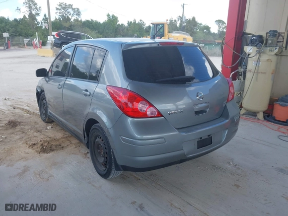 2011 Nissan Versa 1.8 SL with VIN 3N1BC1CP7BL446671, listed as a IAAI auction lot 42003858 with 96,939 mi miles. Bid and sale history available at carsss.com. Image 3.