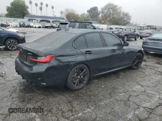 2023 BMW 3 Series 330i with VIN 3MW69FF02P8D60443, listed as a Copart auction lot 43405365 with 0 mi miles and Salvage Title. Bid and sale history available at carsss.com. Image 3.