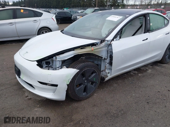2021 Tesla Model 3 Long Range with VIN 5YJ3E1EB3MF856009, listed as a IAAI auction lot 41809767 with 42,072 mi miles. Bid and sale history available at carsss.com. Image 6.