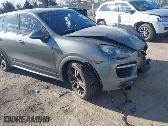 2014 Porsche Cayenne GTS z VIN WP1AD2A27ELA75187, wystawiony jako IAAI lot #41685987 z przebiegiem 77 962 mil mil oraz . Historia ofert i sprzedaży dostępna na DreamBid. Obrazek 1.