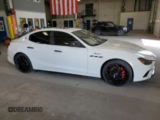 2023 Maserati Ghibli Modena z VIN ZAM57YSMXPX411516, wystawiony jako Copart lot #58330765 z przebiegiem Nie podano mil oraz Szkoda całkowita • Salvage title. Historia ofert i sprzedaży dostępna na DreamBid. Obrazek 4.