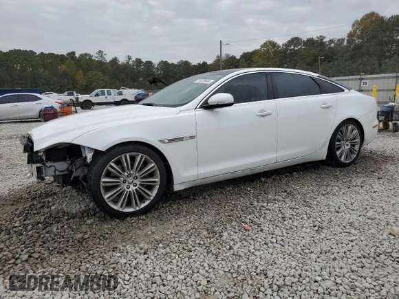 2013 Jaguar XJ with VIN SAJWA2GB8DLV52975, listed as a Copart auction lot 79123644 with 160,473 mi miles and Salvage Title. Bid and sale history available at carsss.com. Image 1.