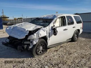 2014 Chevrolet Tahoe Commercial z VIN 1GNLC2E06ER212372, wystawiony jako Copart lot #82332554 z przebiegiem Nie podano mil oraz Szkoda całkowita • Salvage title. Historia ofert i sprzedaży dostępna na DreamBid. Obrazek 1.