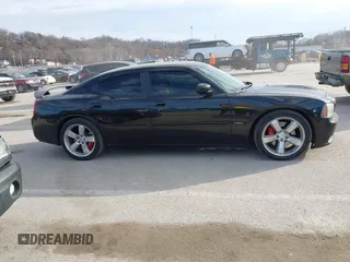 2006 Dodge Charger SRT-8 with VIN 2B3LA73W96H371246, listed as a IAAI auction lot 41676168 with 130,064 mi miles and . Bid and sale history available at carsss.com. Image 13.
