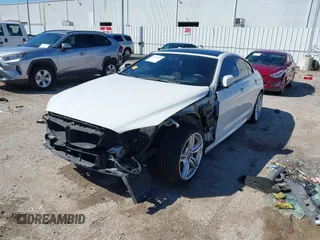 2014 BMW 6 Series 650i xDrive with VIN WBA6B4C5XED099197, listed as a IAAI auction lot 41744557 with 174,613 mi miles. Bid and sale history available at carsss.com. Image 2.
