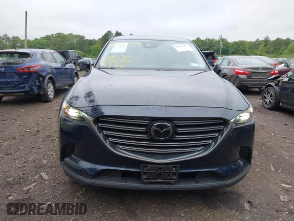 2019 Mazda CX-9 Touring with VIN JM3TCBCY6K0334898, listed as a IAAI auction lot 42467677 with 69,454 mi miles and . Bid and sale history available at DreamBid. Image 12.