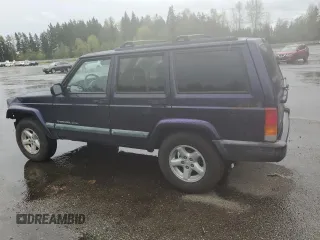 1999 Jeep Cherokee Sport with VIN 1J4FF68S6XL602177, listed as a Copart auction lot 51962355 with 176,386 mi miles and Salvage Title. Bid and sale history available at carsss.com. Image 2.