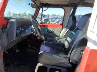 1995 Jeep Wrangler S with VIN 1J4FY19P8SP254147, listed as a Copart auction lot 87699425 with 163,924 mi miles and Clean Title. Bid and sale history available at carsss.com. Image 7.