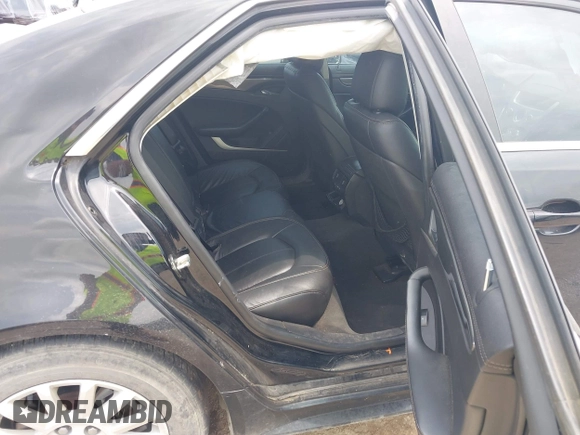 2012 Cadillac CTS with VIN 1G6DA5E55C0156946, listed as a IAAI auction lot 42244345 with 106,189 mi miles and . Bid and sale history available at DreamBid. Image 8.