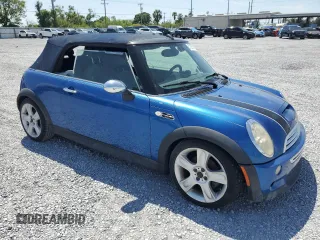 2006 MINI Convertible S with VIN WMWRH33566TK58973, listed as a Copart auction lot 51295575 with Not provided miles and Salvage title. Bid and sale history available at DreamBid. Image 4.