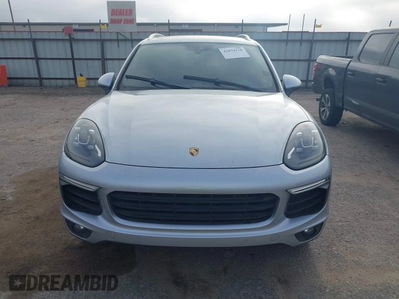 2016 Porsche Cayenne S E-Hybrid with VIN WP1AE2A26GLA59496, listed as a IAAI auction lot 41884022 with 85,386 mi miles and . Bid and sale history available at DreamBid. Image 6.
