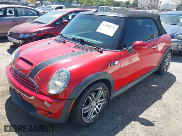 2006 MINI Convertible S with VIN WMWRH335X6TF86044, listed as a IAAI auction lot 42208260 with 165,576 mi miles and . Bid and sale history available at DreamBid. Image 2.