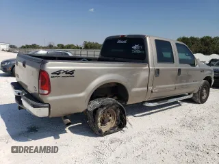 2002 Ford F-350 XL with VIN 3FTSW31F62MA15436, listed as a Copart auction lot 75384314 with 284,637 mi miles and Salvage Title. Bid and sale history available at DreamBid. Image 3.