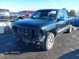 2000 Chevrolet Silverado 1500 LS with VIN 2GCEK19T7Y1200537, listed as a IAAI auction lot 41503486 with 191,143 mi miles. Bid and sale history available at carsss.com. Image 6.