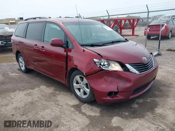 2014 Toyota Sienna LE AAS with VIN 5TDKK3DC4ES462090, listed as a IAAI auction lot 41942354 with 215,814 mi miles. Bid and sale history available at carsss.com. Image 1.